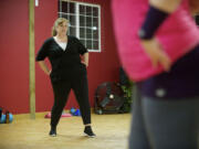 Laina Harris mirrors the moves of the instructor during a Bellyfit class last week in east Vancouver.