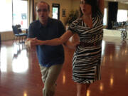 Jim Mains, a consultant from Vancouver, practices the rumba with his &quot;Dancing With the Local Stars&quot; partner, Arthur Murray dance instructor Shirah Walker. The annual Fort Vancouver National Trust fundraiser is at 5p.m. Saturday, Sept.