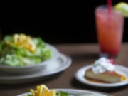 The puerco verde burrito, the chicken bowl and flan at La Solera in Battle Ground.