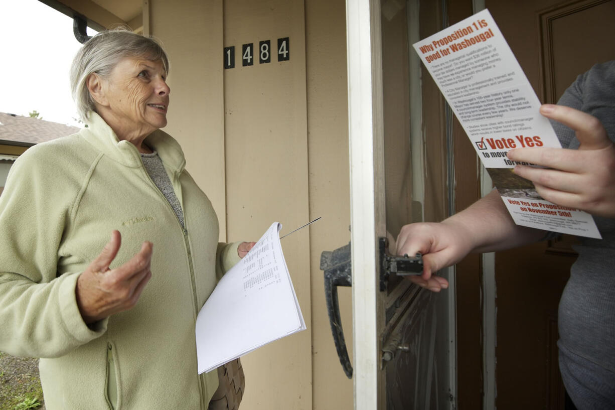 Washougal Councilwoman Joyce Lindsay goes door to door Thursday to talk to registered voters.