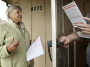 Washougal Councilwoman Joyce Lindsay goes door to door Thursday to talk to registered voters.