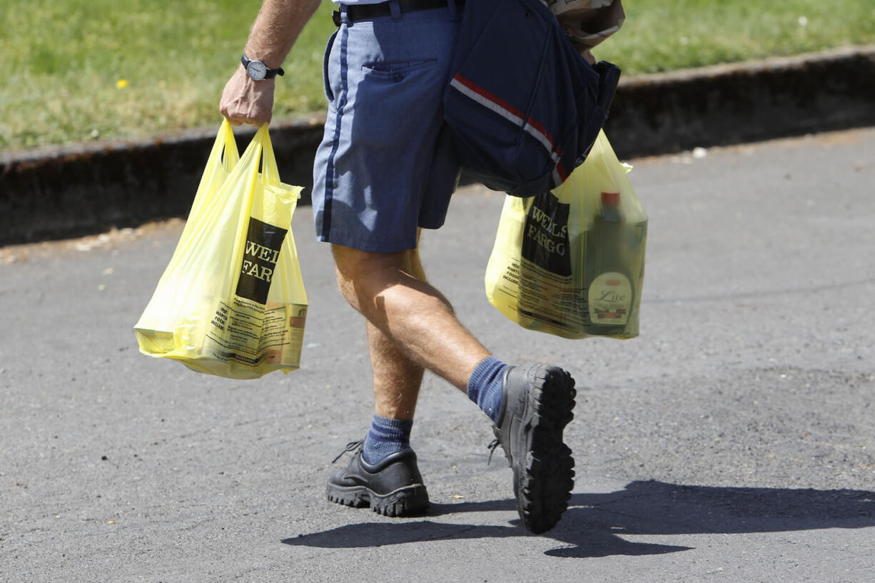 Yellow bags that were distributed empty last week come back full.