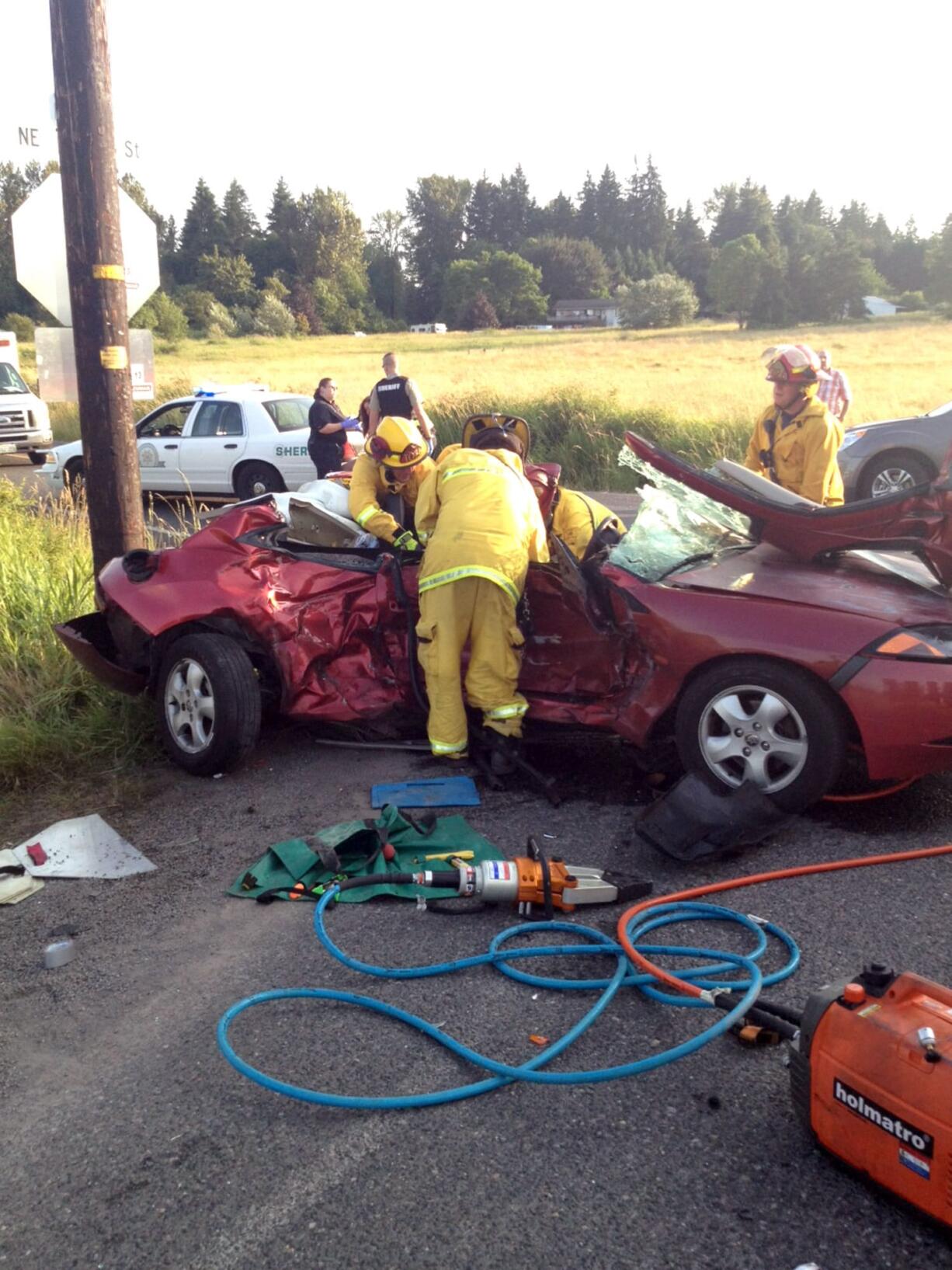 Battalion Chief Brett Graham/Clark County Fire &amp; Rescue
Firefighters help extricate two women trapped in a sedan after a Monday evening T-bone accident at an intersection in Ridgefield.