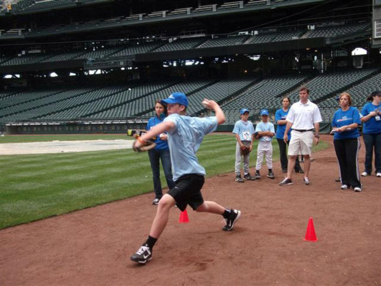 Colin Biggs competed in the Seattle Mariners team competition in the MLC/Aquafina Pitch Hit and Run contest on June 17 at Safeco field.