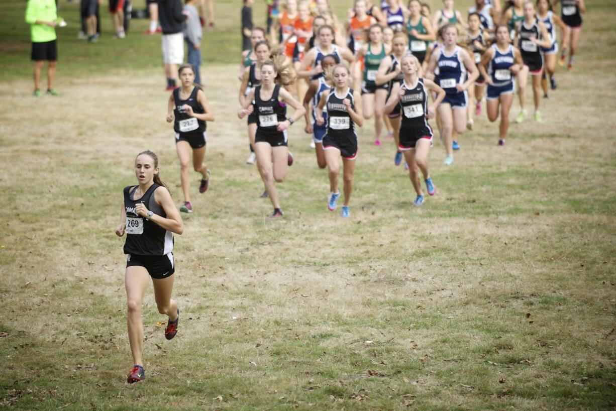 Alexa Efraimson of Camas High School leads a field of runner in the girls 4A district cross country meet Thursday October 18, 2012 at Lewisville Park.