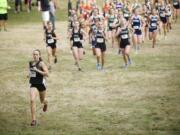 Alexa Efraimson of Camas High School leads a field of runner in the girls 4A district cross country meet Thursday October 18, 2012 at Lewisville Park.