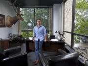 Ryan Hurley, president of Hurley Development, stands in his office inside the former Pacific Tower building, which he recently purchased for $3.2 million.