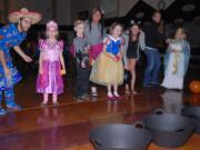 Washougal: Washougal High School's Interact Club members entertain elementary school students at their Monster Mash carnival on Halloween.