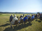 The Port of Camas-Washougal Executive Director David Ripp, center, speaks during the official groundbreaking for the Steigerwald Commerce Center on Thursday.