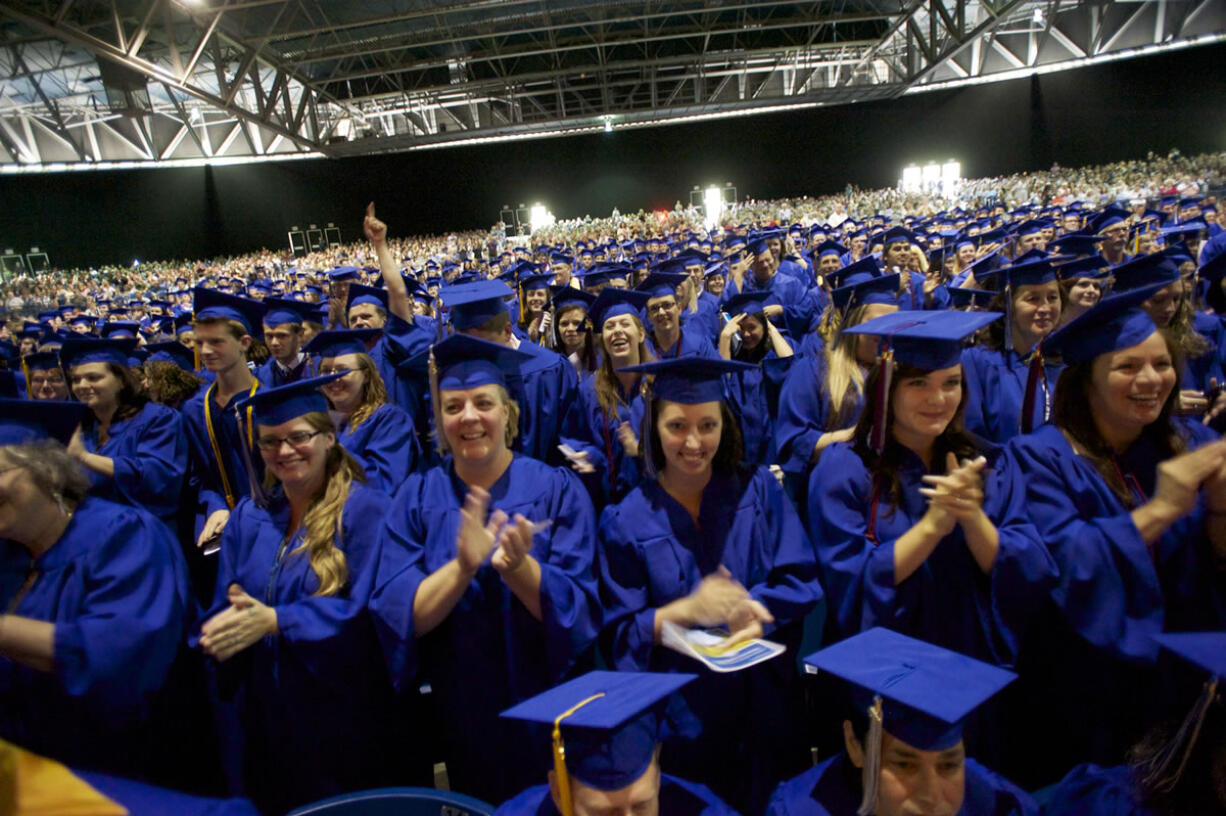 Photos by Steven Lane/The Columbian
A record 1,700-plus students received degrees and certificates from Clark College this year. About 670 of them turned out for commencement on Thursday.