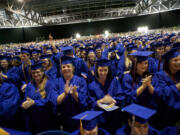 Photos by Steven Lane/The Columbian
A record 1,700-plus students received degrees and certificates from Clark College this year. About 670 of them turned out for commencement on Thursday.