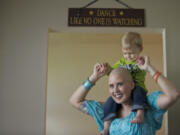 Liz Rowan spends time with her nephew Wesley Yager, 18 months, at their west Vancouver home Monday.