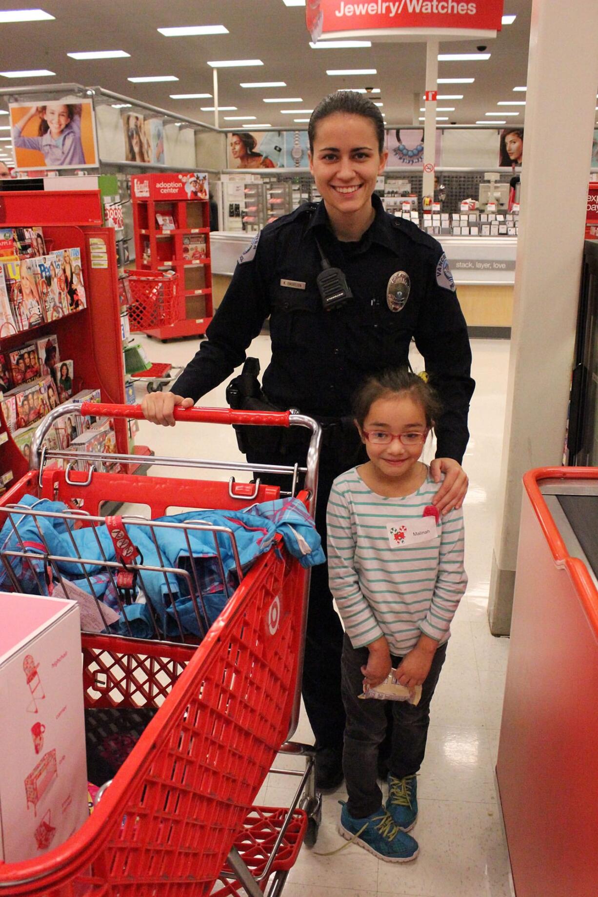 East Vancouver: Vancouver Police Officer Katie Endresen at the 12th annual Nautilus Holiday Helpers, in which Nautilus Inc.