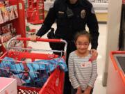 East Vancouver: Vancouver Police Officer Katie Endresen at the 12th annual Nautilus Holiday Helpers, in which Nautilus Inc.