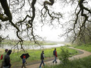 Park Ranger Josie Finley leads a tour Sunday afternoon at the Ridgefield National Wildlife Refuge's Carty Unit.