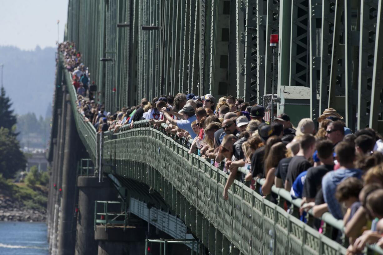 Thousands line the I-5 Bridge during the 8th annual Hands Across the Bridge celebration, Monday.