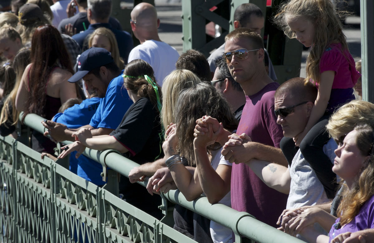 Thousands line the northbound span of the Interstate 5 Bridge during the 11th annual Hands Across the Bridge celebration of freedom from drug and alcohol addiction.