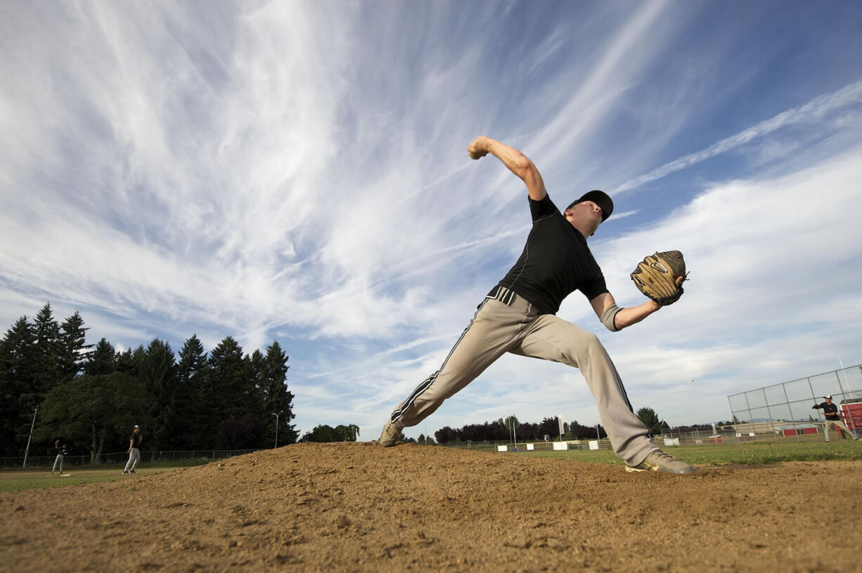 Central Vancouver Little League pitcher Dawson Allen warms up at practice Monday in preparation for the Junior League Baseball Western Regional at Clark College this week.