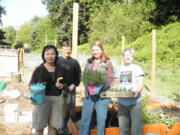 Salmon Creek: Karen Anderson, from left, Joy Olsen, Dorrie Estribou and Carol Peterson show off some of the goodies from God's Garden.