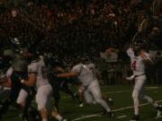 Reilly Hennessey threw touchdown passes to John Norcross, Zach Eagle, Connor Maloney and Jack Beall Friday, at McKenzie Stadium.