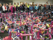 About 150 employee volunteers, social workers and community members built 417 bikes in less than three hours Thursday for Waste Connections&#039; 15th annual Christmas Promise Bike Build. On Friday, volunteers delivered 120 bicycles for foster kids at the Washington State Department of Social and Health Services building in Vancouver.