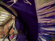 Photos by Steven Lane/The Columbian
Sydney Moore, 18, of Vancouver dances Saturday during the Grand Entry at the Title VII Native American Indian Education Program's annual pow-wow at Covington Middle School in Vancouver.