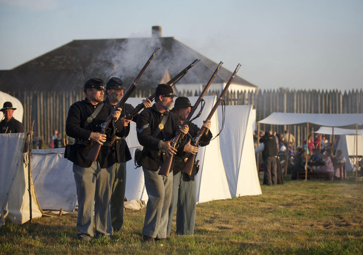 Alex Johnson, Greg Moore, Ben Keeley and Dan Jones (left to right), depict soldiers from the First Oregon Volunteers of the Federal Army.