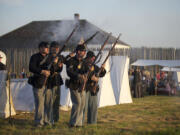 Alex Johnson, Greg Moore, Ben Keeley and Dan Jones (left to right), depict soldiers from the First Oregon Volunteers of the Federal Army.