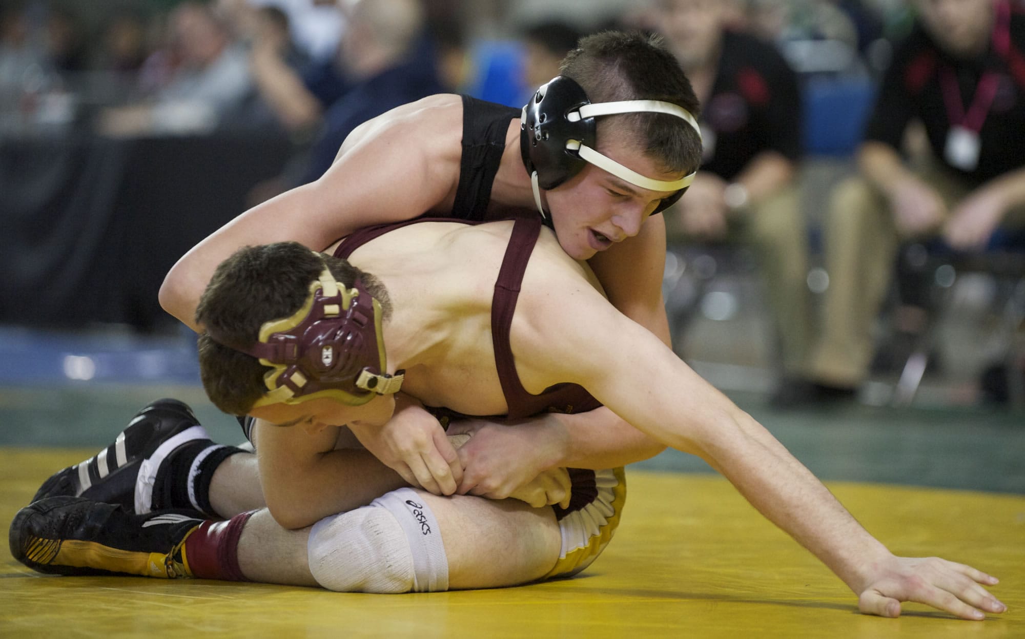 Camas' Tye Lommasson beats Brad Fox from Moses Lake in the 126-pound weight class quarterfinals of the 4A State Wrestling Tournament in Tacoma, Friday, February 15, 2013.