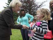 Laney Fant, 5, a student at the Patricia Nierenberg Child Care and Early Learning Center, welcomes U.S. Sen. Patty Murray, D-Wash., to the center on Friday.