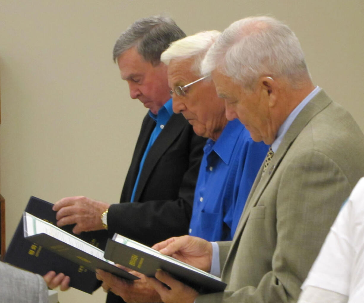 Hazel Dell: Former Vancouver Mayor Royce Pollard, from left, former State Sen. Al Bauer and Curtis Loop, retired major general, were honored for their service in South Korea at the Sept. 19 meeting of Southwest Washington's Richard L.