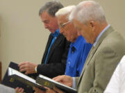 Hazel Dell: Former Vancouver Mayor Royce Pollard, from left, former State Sen. Al Bauer and Curtis Loop, retired major general, were honored for their service in South Korea at the Sept. 19 meeting of Southwest Washington's Richard L.