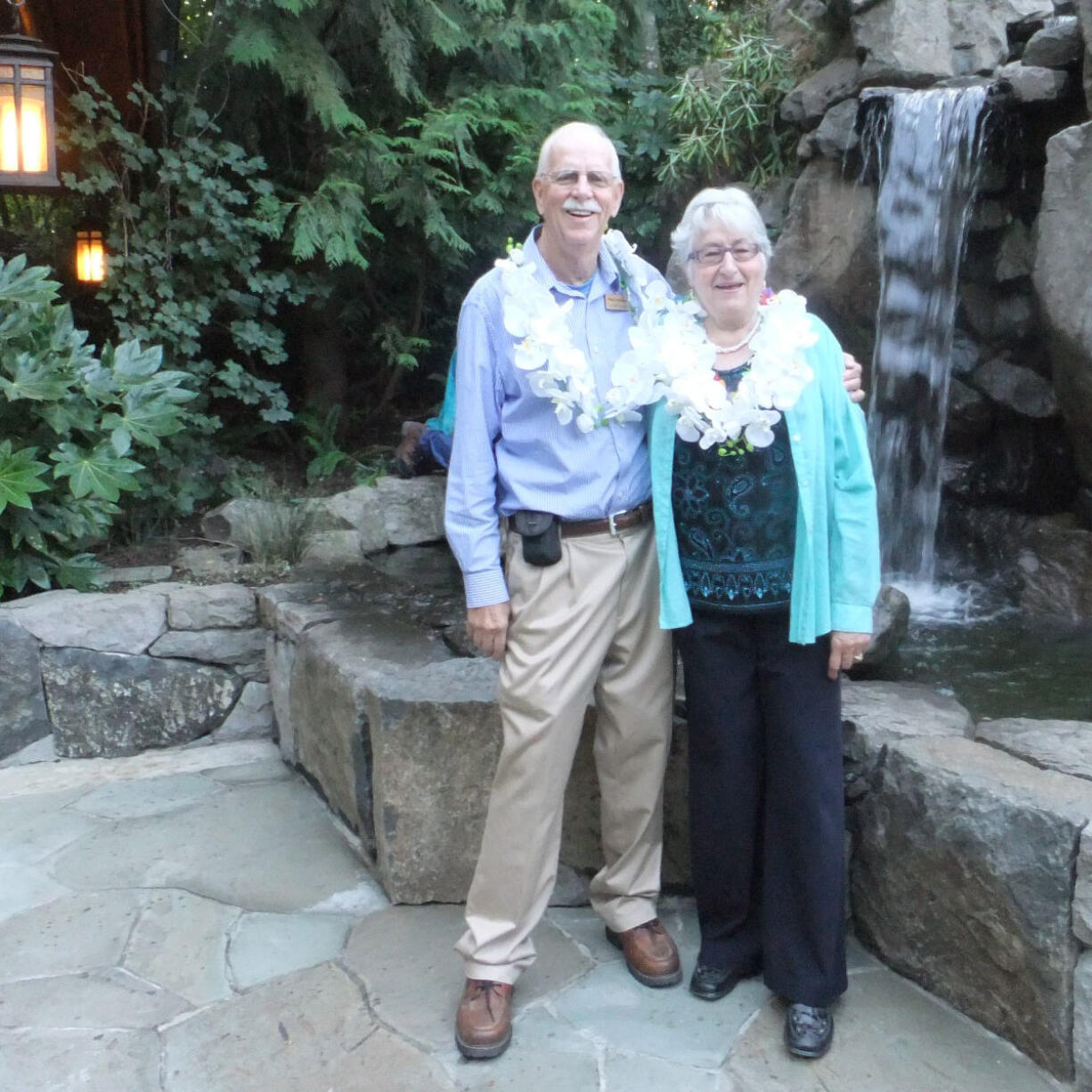 Ridgefield: Noel and Nancy Johnson of Lewis River.com posed for a Polynesian-themed photo before they snapped photos of the 100 guests at the La Center Historical Museumis gala Sept. 15 at Summit Grove Lodge.