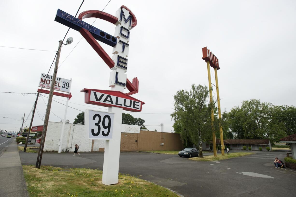 Aging signs promoting a $21 stay at the Value Motel have been replaced with new signs -- with more accurate room rental rates -- such as this one on Highway 99 in Hazel Dell.