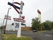 Aging signs promoting a $21 stay at the Value Motel have been replaced with new signs -- with more accurate room rental rates -- such as this one on Highway 99 in Hazel Dell.