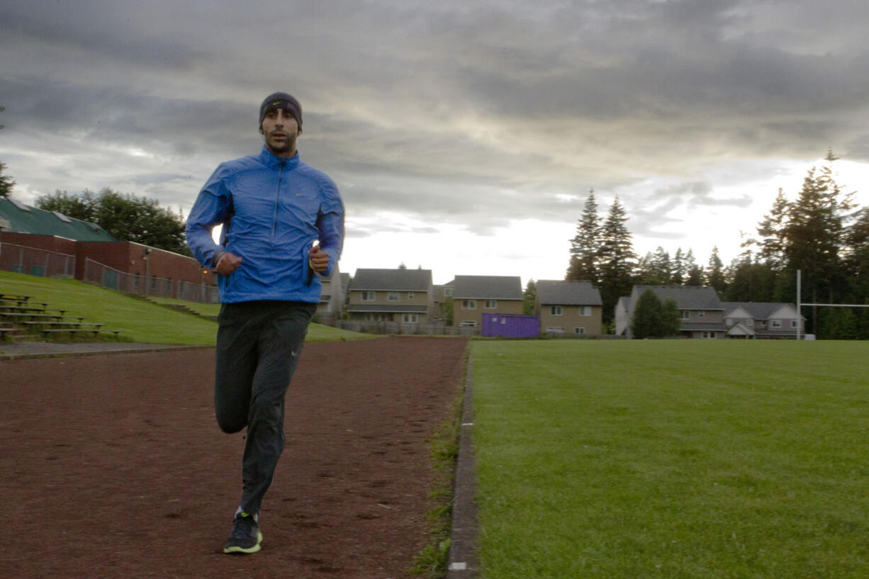 Youssef Zirari goes for a short training run on Thursday, June 13, 2013. &quot;Marathons aren't about the competitor, or about beating someone,&quot; Zirari said, &quot;They are about you, just you, and competing with yourself.&quot; Zirari will compete in the Vancouver Marathon this coming Sunday.