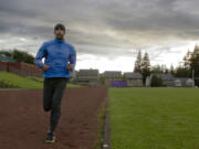 Youssef Zirari goes for a short training run on Thursday, June 13, 2013. &quot;Marathons aren't about the competitor, or about beating someone,&quot; Zirari said, &quot;They are about you, just you, and competing with yourself.&quot; Zirari will compete in the Vancouver Marathon this coming Sunday.