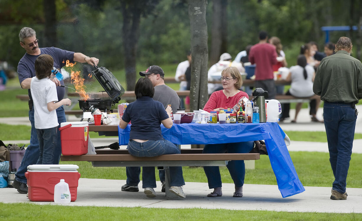 Salmon Creek Park at Klineline Pond, which drew plenty of picnickers on June 14, 2009, is again -- as of this month -- free of parking fees.