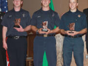 Ridgefield: Bryan Carroll, from left, Travis Mayer and Josh Haldeman of Clark County Fire &amp; Rescue just graduated from Washington State Firefighters Academy.