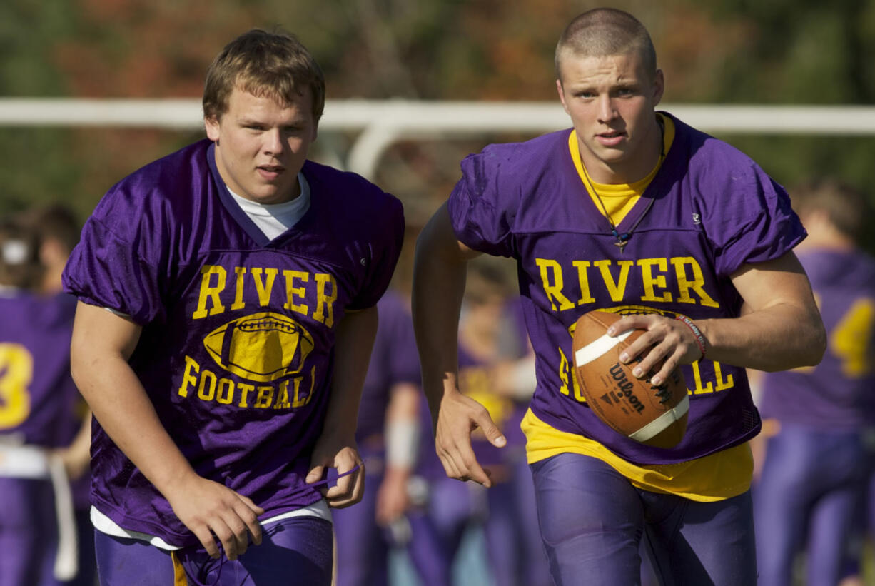 Columbia River football players Dillon Willis, left, and David Snuffin.