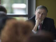 Democratic Gov. Jay Inslee meets with more than two dozen business and local government leaders at the Vancouver Community Library on March 22. He stressed the importance of building the Columbia River Crossing, as well as the divisiveness of the megaproject.