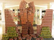 Esther Short: Vancouver employees of BergerABAM and the Holland Partner Group built this structure of cartoon character Wreck-it Ralph out of food cans.