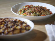 The Barbecue Pork Mac &amp; Cheese, foreground, and Bangkok Curry at Noodles &amp; Company.