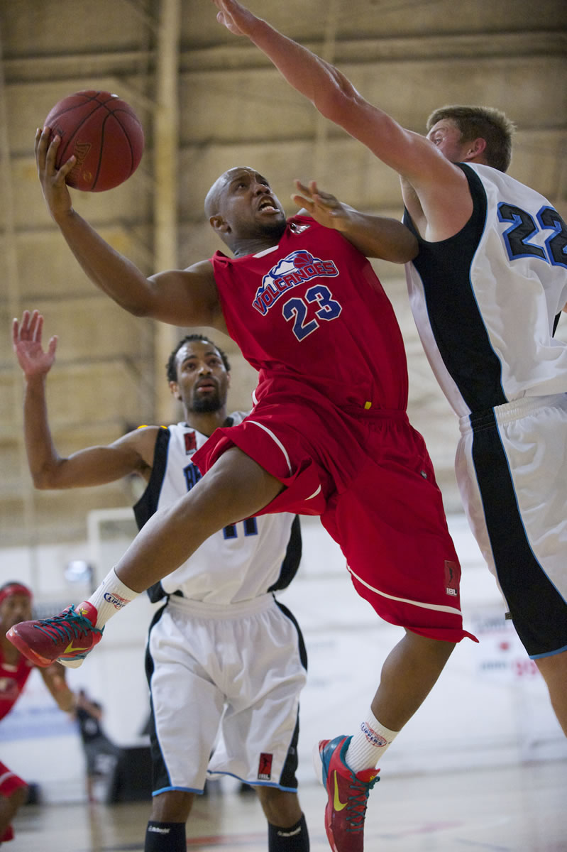 Vancouver Volcanoes Andre Murray (23) drives to the basket against Bellingham Slam's Jacob Stevenson (22) during the IBL championship game Friday.