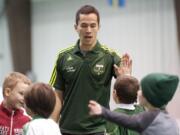 Portland Timbers player Brent Richards attends a youth soccer clinic at the Clark County Indoor Sports Center on Jan.