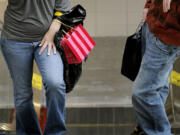 Shoppers visit Westfield Vancouver mall.