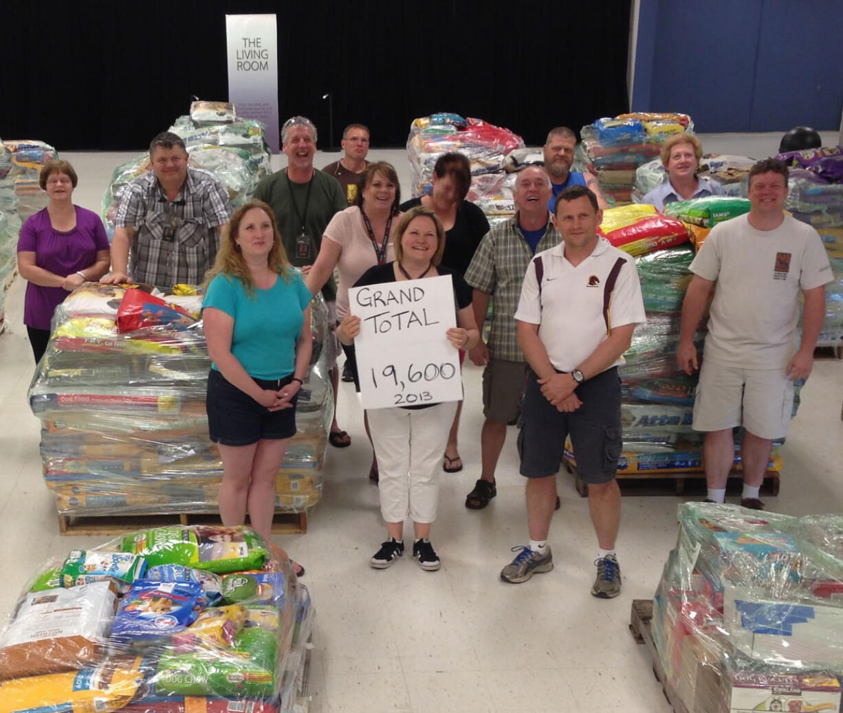 Living Hope Church
Living Hope Church staff and volunteers pose with nearly 19,600 pounds of donated pet food earlier this month. They believe the total is enough to break the current Guinness World Record for &quot;largest donation of pet food in one week&quot; and are awaiting official word from the company, famous for tracking such achievements.