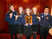 Woodland -- Woodland High School students Geneva Ford, from left, Gabby Bender, Kristi Gillaspie, Tristian Beaty and Ivan Nunez show off their awards Oct.