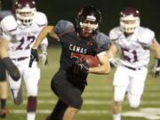 Camas' Nate Beasley runs the ball for a touchdown against South Kitsap on Friday.