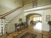 A grand staircase is one of the central features of a luxury home located at 1728 S.E. Lieser Point Road that's part of a free tour of high -end homes this Sunday. The self-guided tour of high end houses includes houses from Washougal to Woodland.